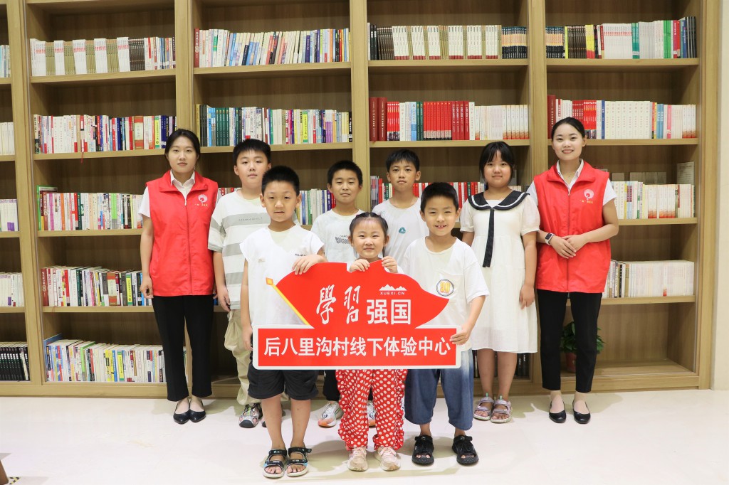 后八里沟村“学习强国”线下推广进商铺志愿服务活动
